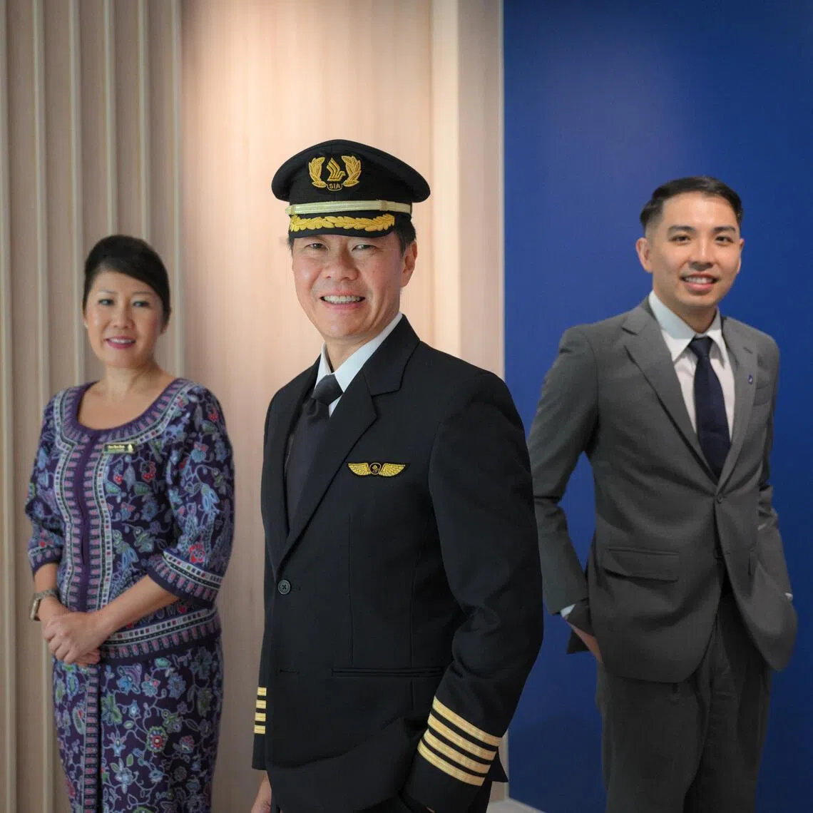 (From left) SIA inflight manager Gan Bee Bee, Captain Leonard Wee and Mr Colin Aw, acting manager of airport operations at SIA.