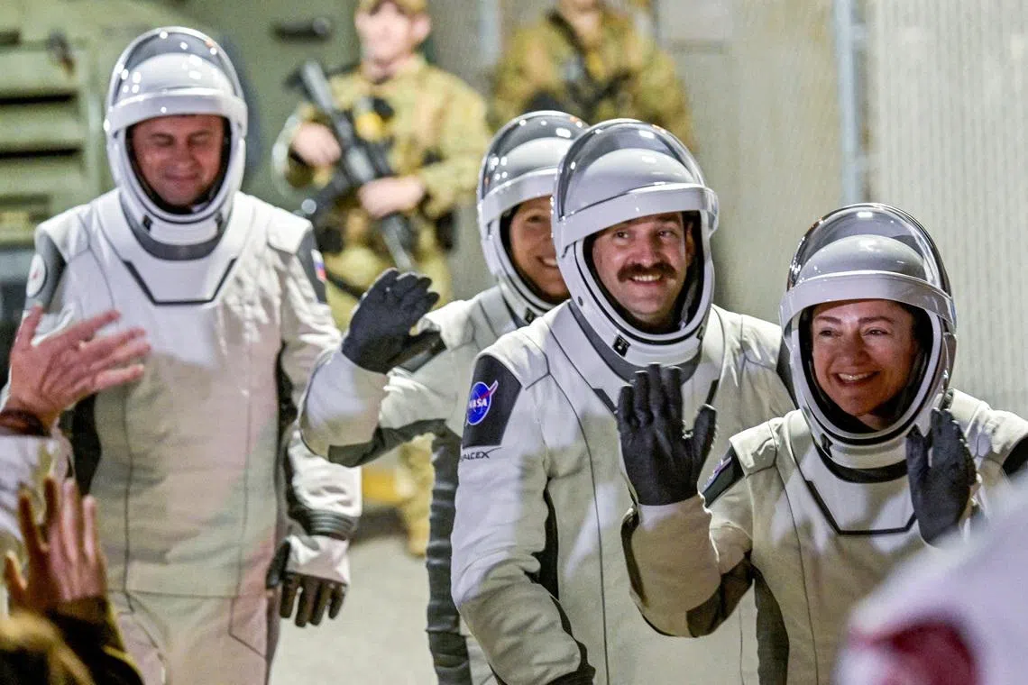 FILE PHOTO: NASA’s Crew-12 members, Russian cosmonaut Andrey Fedyaev, ESA astronaut Sophie Adenot, NASA astronauts Jack Hathaway and Jessica Meir  walk out of the Operations & Checkout Building at the Kennedy Space Center before transport to Launch Complex 40, ahead of their launch to the International Space Station, in Cape Canaveral, Florida, U.S., February 13, 2026. REUTERS/Steve Nesius/File Photo