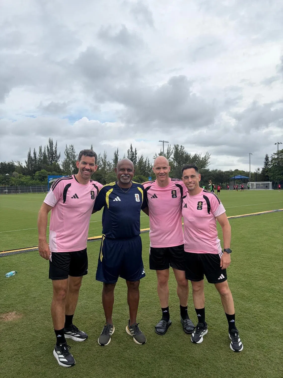 M. Ganesan (second from left) with the English refereeing team of Adam Nunn, Anthony Taylor and Gary Beswick. Ganesan is in his third World Cup as a FIFA fitness instructor.