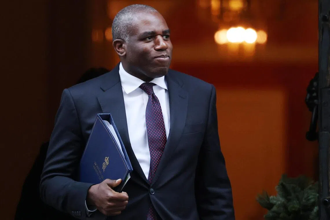 epa12564307 British Justice Secretary David Lammy departs 10 Downing Street in London, Britain, 02 December 2025. Justice Secretary David Lammy is set to announce at parliament if he intends to scrap jury trials for all but the most serious cases as part of wider efforts to tackle the huge backlog of court cases in the UK.  EPA/Andy Rain
