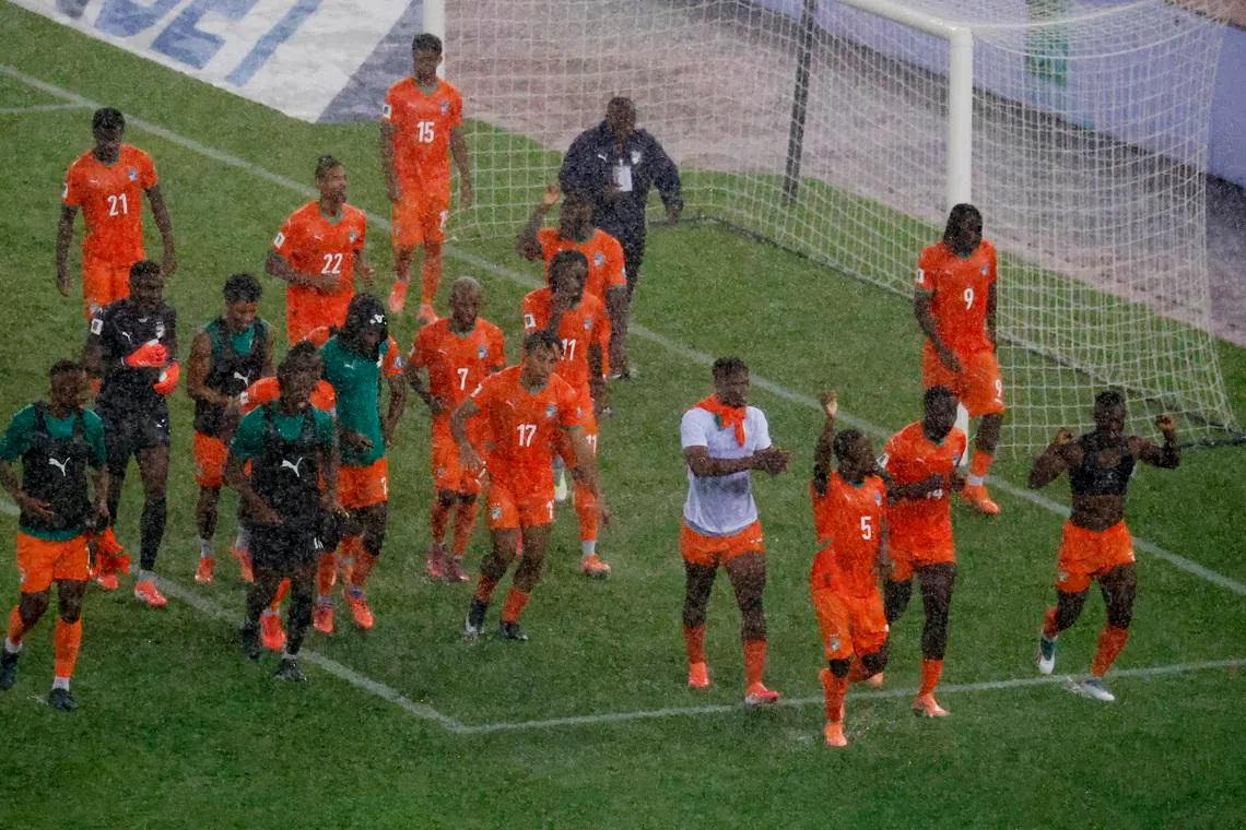 Soccer Football - FIFA World Cup - CAF Qualifiers - Group F - Ivory Coast v Kenya - Alassane Ouattara Stadium, Abidjan, Ivory Coast - October 14, 2025 Ivory Coast celebrate qualifying for the World Cup REUTERS/Luc Gnago