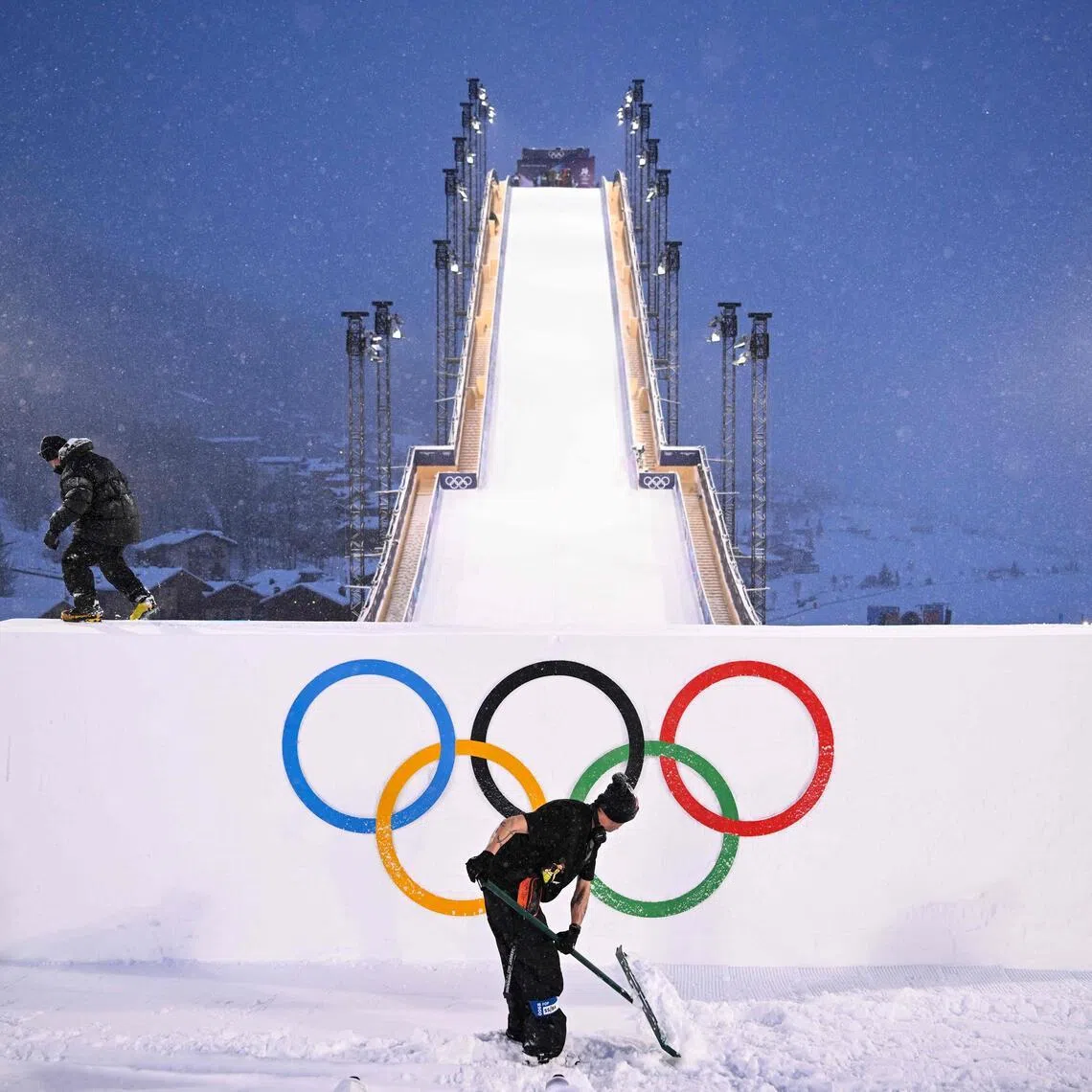 Workers preparing the venue ahead of the Winter Games' snowboarding events on Feb 4, in Livigno, Italy.