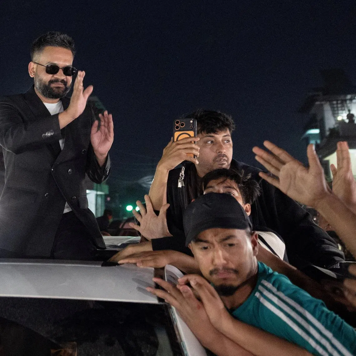 Balendra Shah, a rapper-turned-politician and the prime ministerial candidate for Rastriya Swatantra Party (RSP), greets his supporters as he celebrates after winning the election, in Damak, Jhapa district, Nepal, March 7, 2026. REUTERS/Adnan Abidi