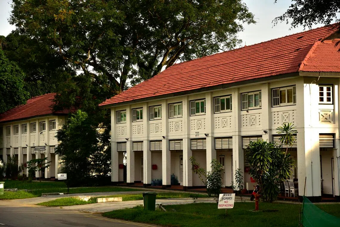 Colonial black and white houses along Old Birdcage Walk in Seletar.