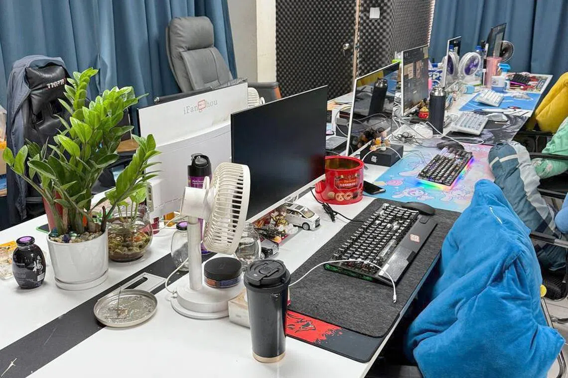 This pool photo taken on July 15, 2025 and released on July 16 by Agence Kampuchea Presse (AKP) shows computers and equipment during a raid on a scam centre in Phnom Penh. Cambodian authorities have arrested more than 200 Vietnamese nationals in internet scam centre raids, police said on July 16, 2025 as Prime Minister Hun Manet ordered a crackdown on cybercrime sweatshops. (Photo by POOL / AFP)