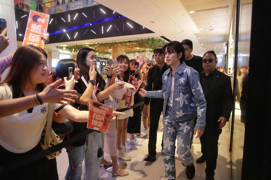 Taiwanese singer Jam Hsiao (in denim jacket) made an appearance at AtTea Singapore’s flagship store in 313@Somerset for its second anniversary celebration on April 10 2023.