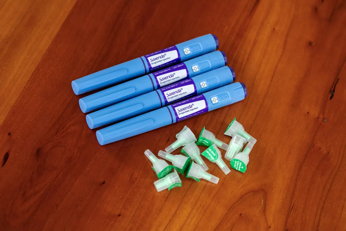 A selection of injector pens for the Saxenda weight loss drug are shown in this photo illustration in Chicago, Illinois, U.S., March 31, 2023.  REUTERS/Jim Vondruska/Illustration