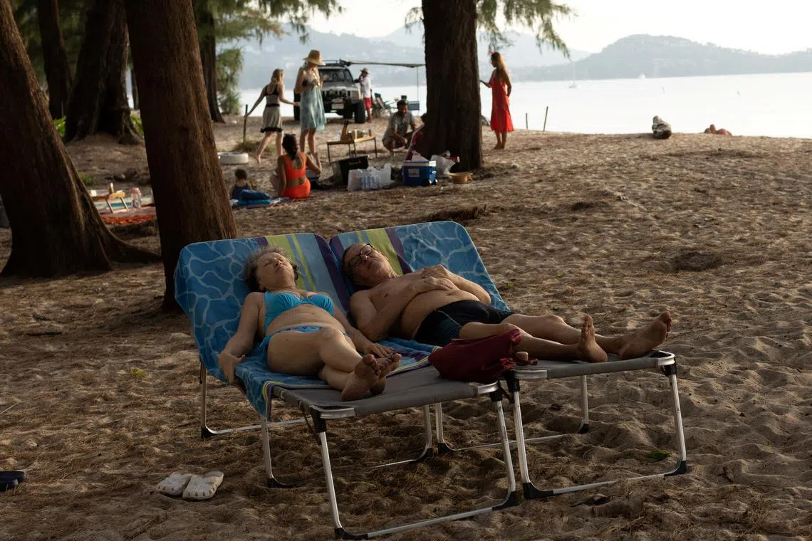 Russian tourists at Layan Beach in Phuket on Dec 25. Thailand is seeing a much-needed tourism boom.
