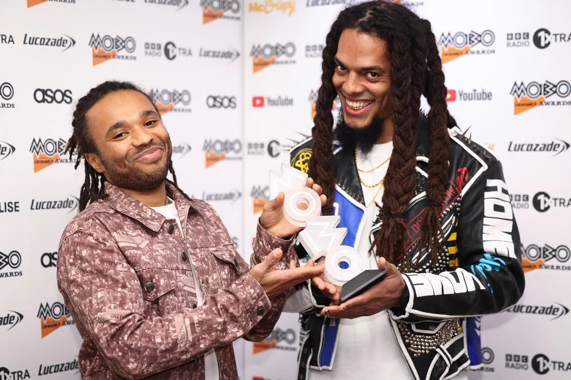 FILE PHOTO: Bob Vylan hold the Best Alternative Music Act Award during the 25th MOBO Awards in London, Britain November 30, 2022. REUTERS/Henry Nicholls/File Photo
