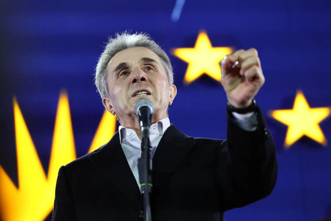 Georgian oligarch and founder of the ruling Georgian Dream party Bidzina Ivanishvili gives a speech during a gathering at the party's headquarters after exit polls were announced during parliamentary elections in Tbilisi on October 26, 2024. (Photo by Giorgi ARJEVANIDZE / AFP)