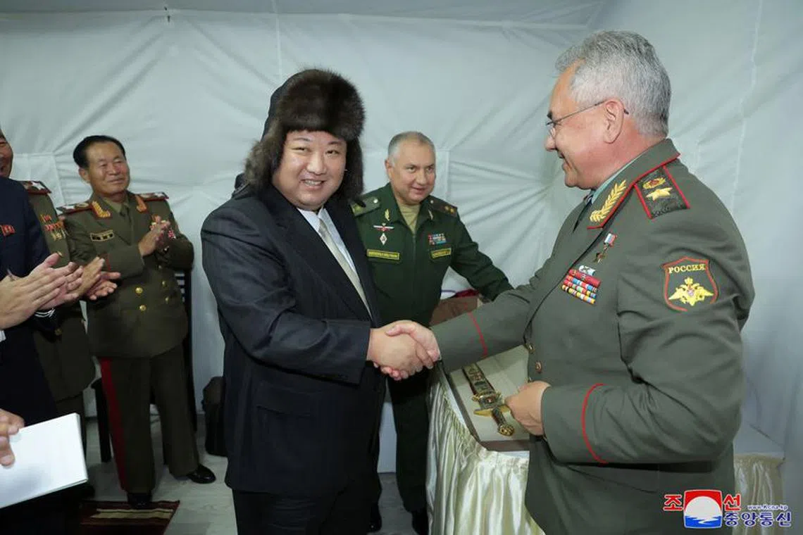 North Korean leader Kim Jong Un shakes hands with Russia's Defence Minister Sergei Shoigu, as he visits Vladivostok, Russia, September 16, 2023 released by the Korean Central News Agency on September 17, 2023. KCNA via REUTERS