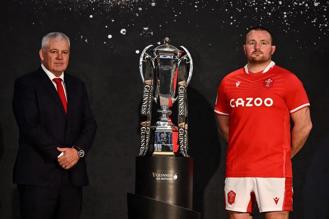 Wales coach Warren Gatland and captain Ken Owens pose with the Six Nations trophy. The tournament begins on Saturday with Wales taking on world No. 1 Ireland at the Millennium Stadium in Cardiff. 