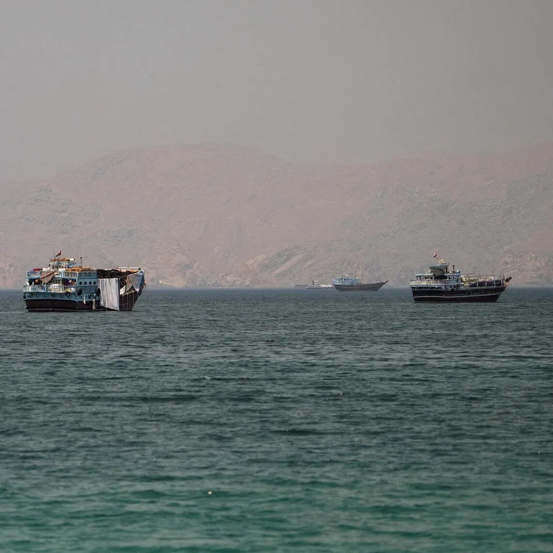 Vessels at the Strait of Hormuz, as seen from Musandam, Oman, on June 22