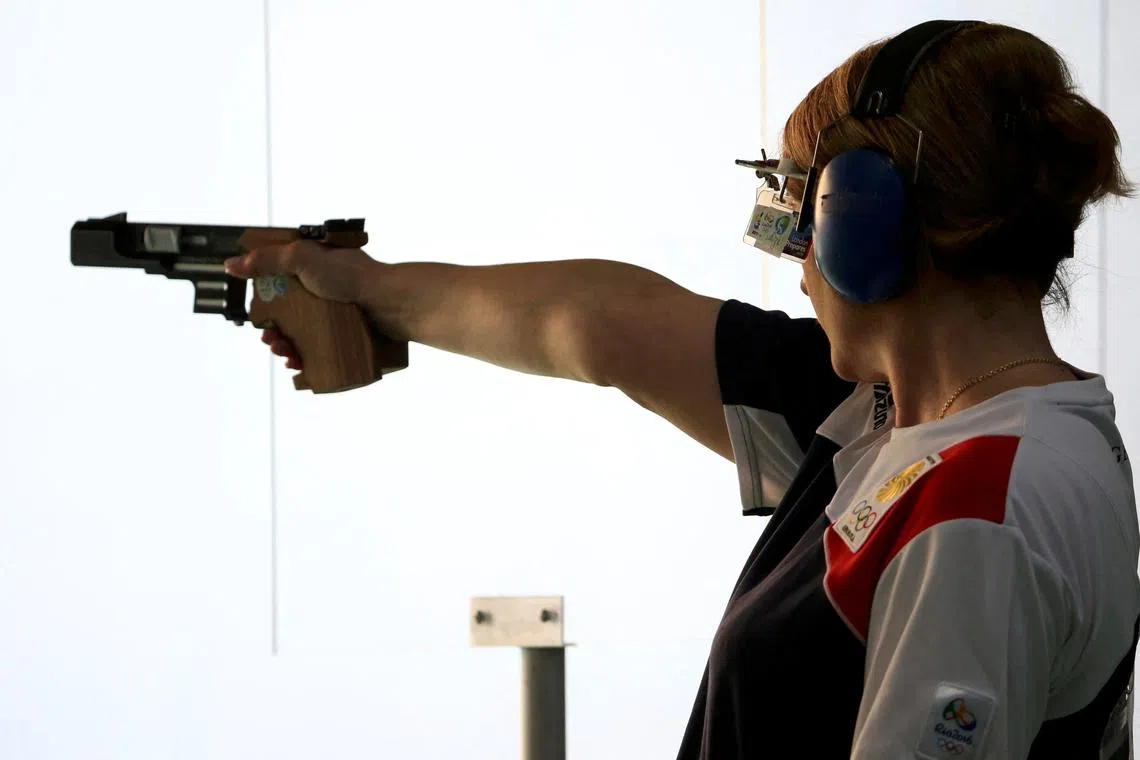 FILE PHOTO: 2016 Rio Olympics - Shooting - Preliminary - Women's 25m Pistol Qualification Precision - Olympic Shooting Centre - Rio de Janeiro, Brazil - 09/08/2016. Nino Salukvadze (GEO) of Georgia competes. REUTERS/Edgard Garrido/File Photo