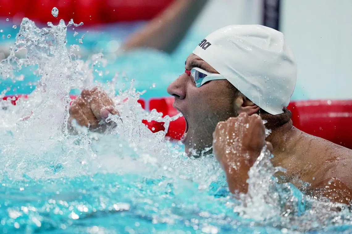 FILE PHOTO: Tokyo 2020 Olympics - Swimming - Men's 400m Freestyle - Final - Tokyo Aquatics Centre - Tokyo, Japan - July 25, 2021. Ahmed Hafnaoui of Tunisia reacts after winning gold. REUTERS/Aleksandra Szmigiel/File Photo