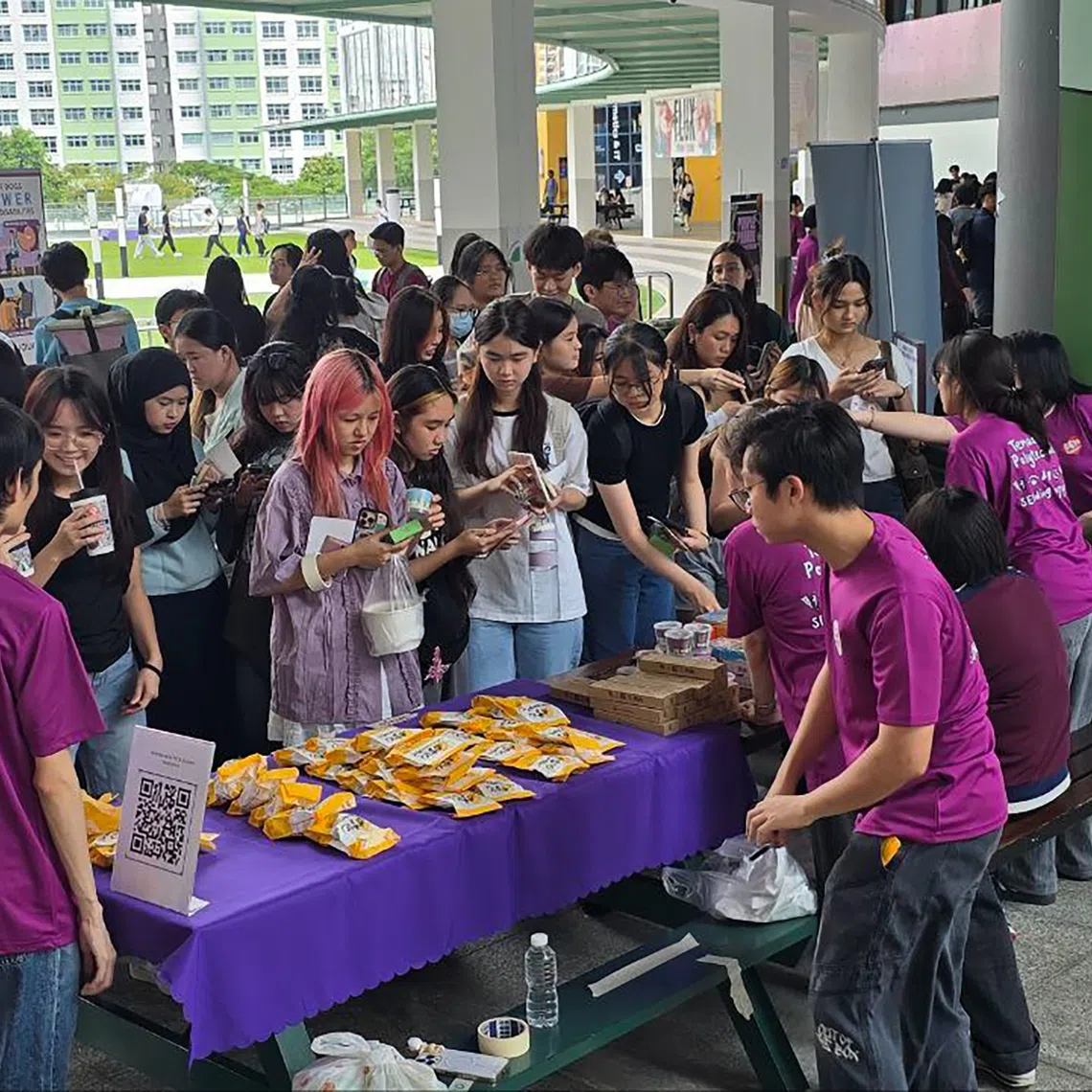 SENvocates members running a booth at the Purple Parade activation at TP in 2025. CREDIT: TP