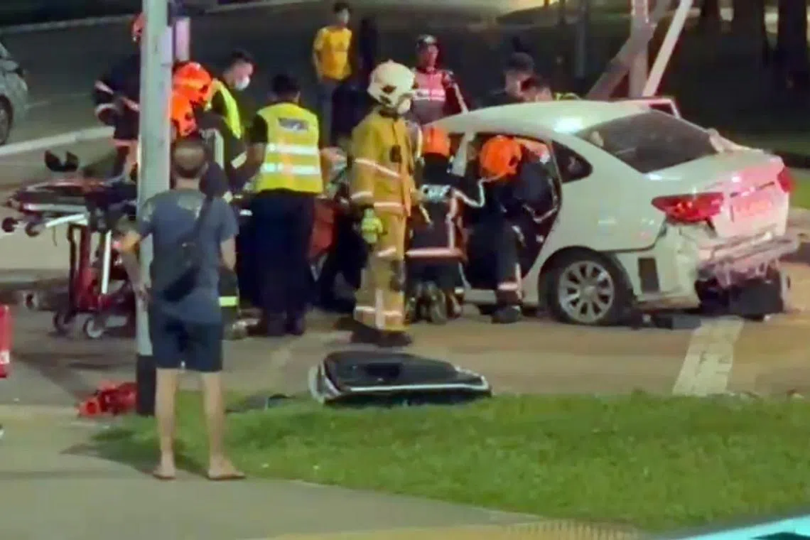 SCDF officers had to use hydraulic rescue equipment to free a female passenger who was trapped in the car.