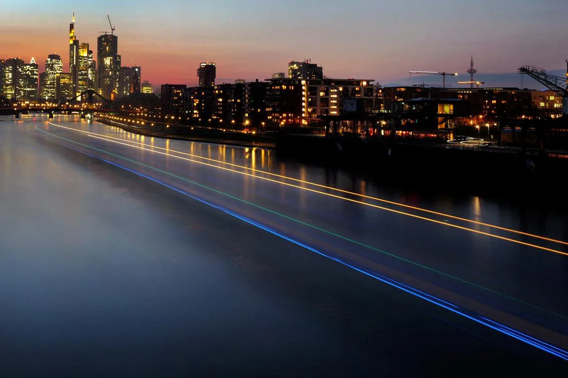 FILE PHOTO: The skyline with the banking district is seen during sunset in Frankfurt, Germany, February 27, 2024.  REUTERS/Kai Pfaffenbach/File Photo