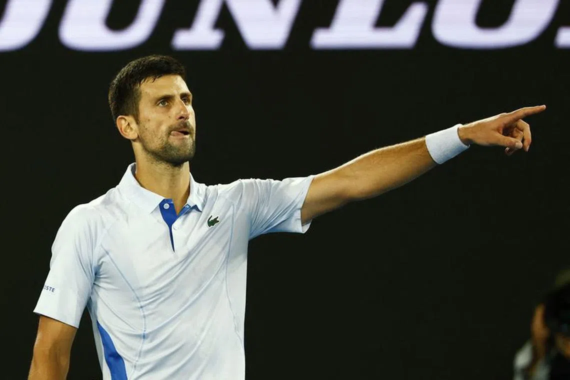 Tennis - Australian Open - Melbourne Park, Melbourne, Australia - January 14, 2024 Serbia's Novak Djokovic reacts after winning his first round match against Croatia's Dino Prizmic REUTERS/Issei Kato