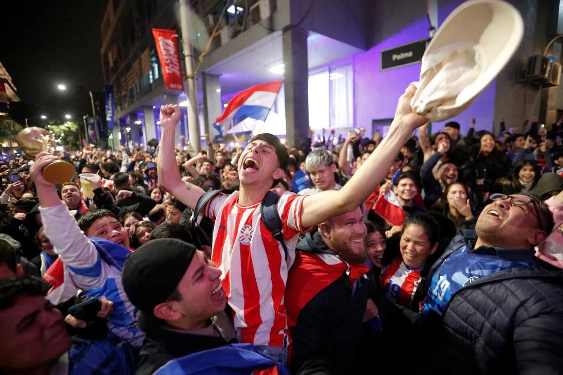 Soccer Football - FIFA World Cup 2026 - Round of 32 - Germany v Paraguay - Fans gather in Asuncion - Asuncion, Paraguay - June 29, 2026 Paraguay fans celebrate in Asuncion after the match REUTERS/Cesar Olmedo