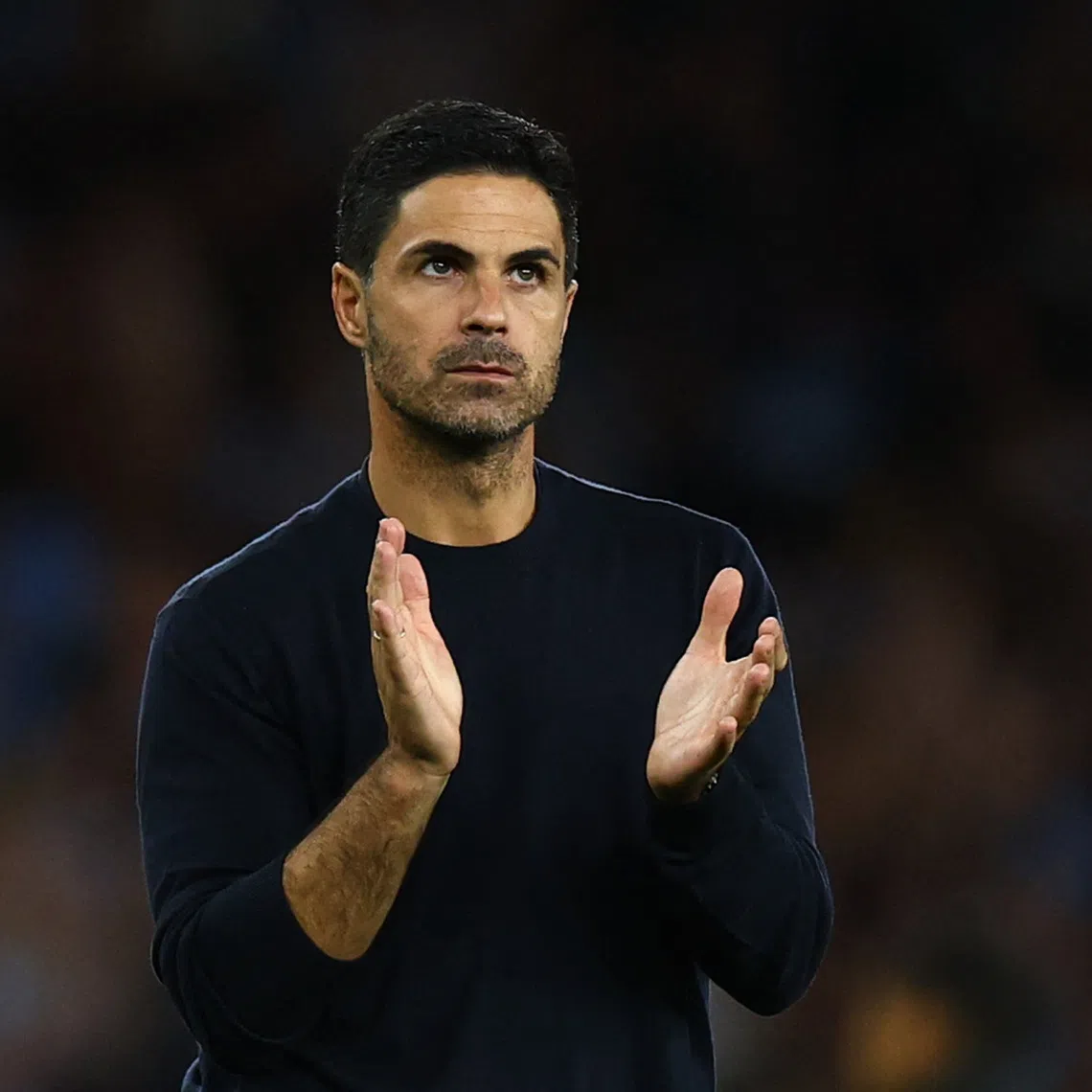Soccer Football - Premier League - Arsenal v Coventry City - Emirates Stadium, London, Britain - August 21, 2026 Arsenal manager Mikel Arteta applauds fans after the match Action Images via Reuters/Peter Cziborra