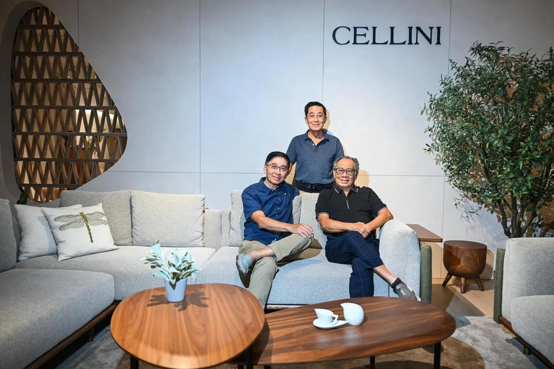 Cellini founder Tan Cheng Whatt (right, seated) with his younger brothers Jimmy Tan (seated next to him) and Tan Cheng Liang (behind), who have worked alongside him since the brand’s inception 40 years ago. They are grouped around Cellini’s Celadon modular fabric sofa.