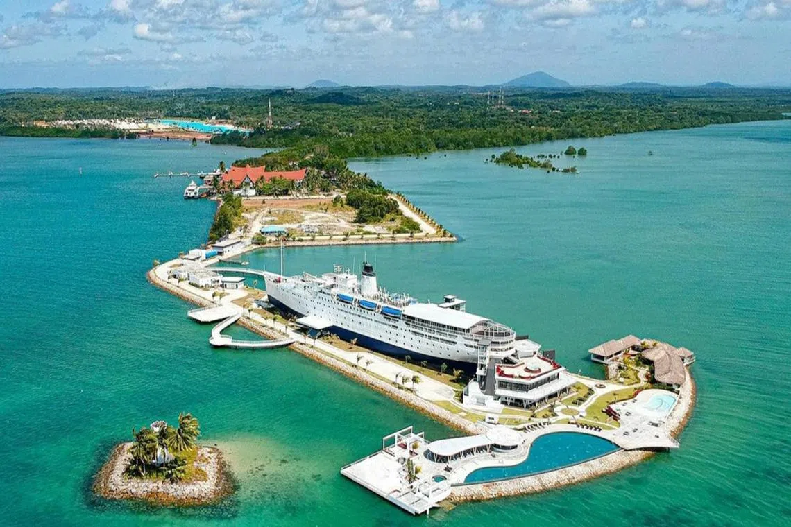 The Doulos Phos ship sits on a plot of reclaimed land shaped like an anchor along Bintan Island’s coast. 