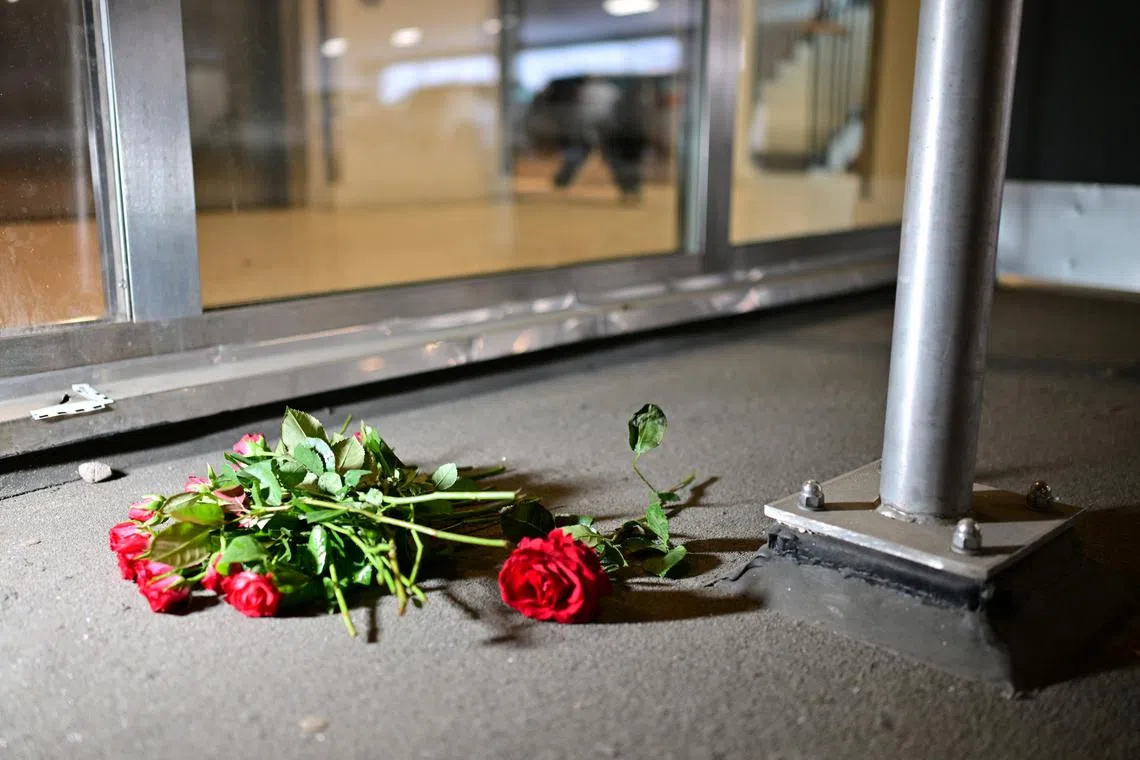 FILE PHOTO: Roses are  laid  at Selma Lagerlofs square in Gothenburg after the famous rapper C. Gambino was shot to death on Tuesday evening in a parking garage in Gothenburg, Sweden on june 05, 2024. TT News Agency/Bjorn Larsson Rosvall via REUTERS/File photo