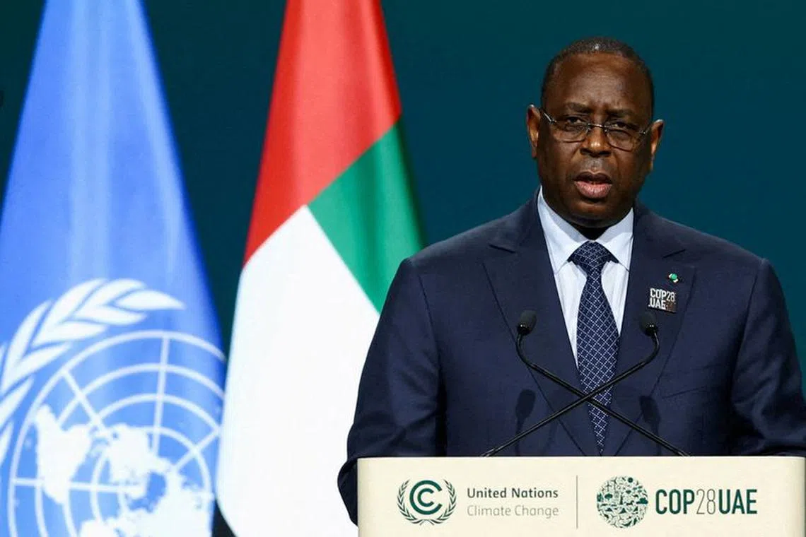 FILE PHOTO: President of Senegal Macky Sall delivers a national statement at the World Climate Action Summit during the United Nations Climate Change Conference (COP28) in Dubai, United Arab Emirates, December 1, 2023. REUTERS/Amr Alfiky