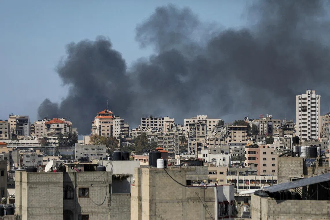Smoke rises during an Israeli raid at Al-Shifa hospital and the area around it, amid the ongoing conflict between Israel and the Palestinian Islamist group Hamas, in Gaza City, March 20, 2024. REUTERS/Dawoud Abu Alkas