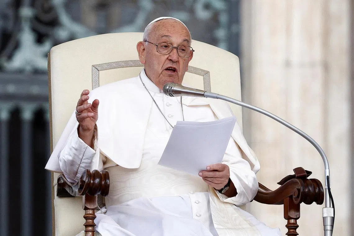 FILE PHOTO: Pope Francis attends the weekly general audience, in Saint Peter Square at the Vatican, May 22, 2024. REUTERS/Guglielmo Mangiapane/File Photo