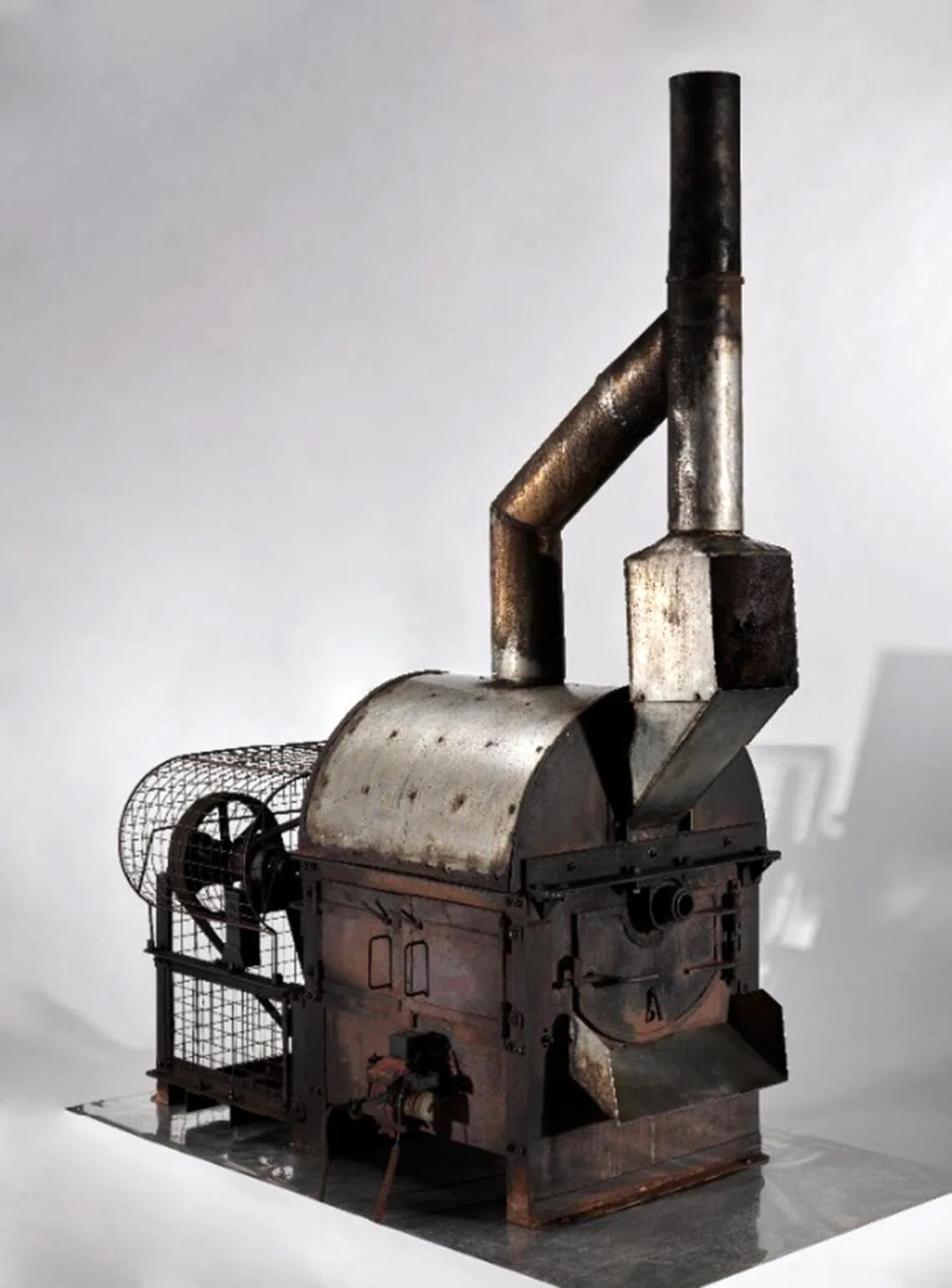 A traditional Nanyang coffee roasting machine of Ho Tit Coffee Powder Factory.
