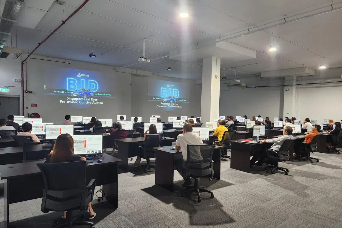 Under the live auction system, Dickson first purchases the used car from the owner, then puts it up for auction. 