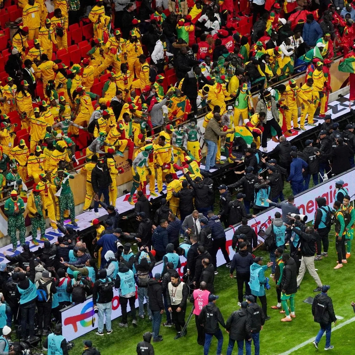 FILE PHOTO: Soccer Football - CAF Africa Cup of Nations - Morocco 2025 - Final - Senegal v Morocco - Prince Moulay Abdellah Stadium, Rabat, Morocco - January 18, 2026 Senegal fans react in the stand after Morocco were awarded a penalty following a VAR review REUTERS/Stringer/File Photo
