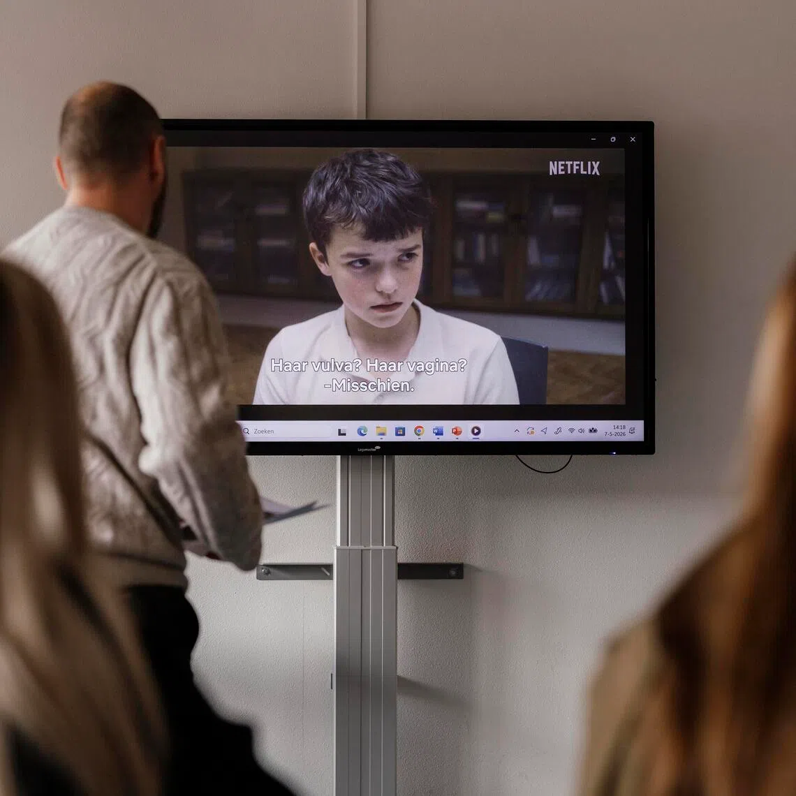 Gijs Korenblik, a teacher in Warnsveld, the Netherlands, shows a scene from Adolescence in class on May 7.