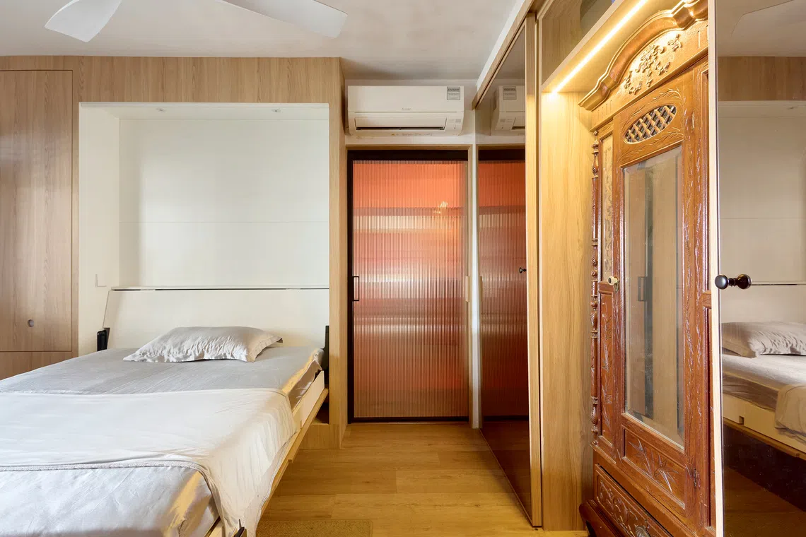 With its remote-controlled Murphy bed, the bedroom can be quickly converted into an exercise area or cat playroom. 