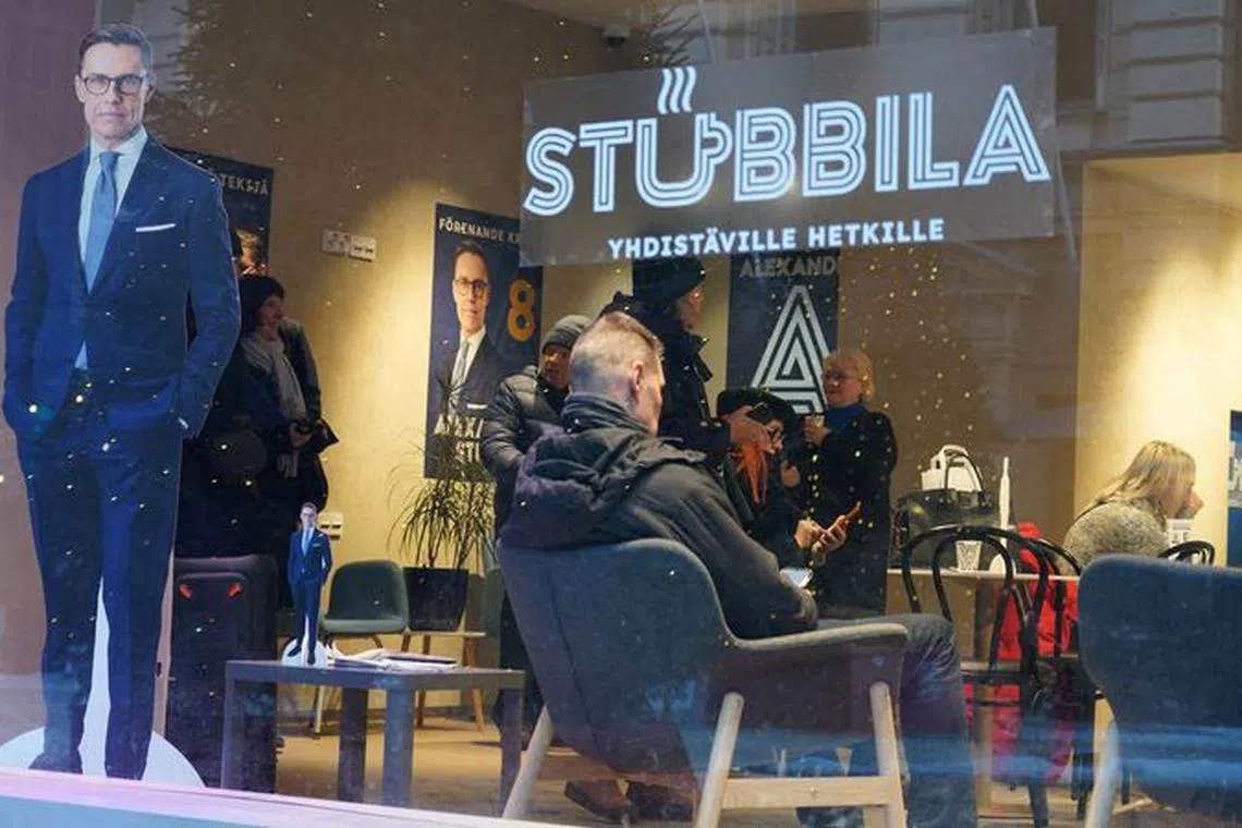 A cut-out of National Coalition Party (NCP) Presidential candidate Alexander Stubb is seen in the window of his campaign cafe in Helsinki, Finland, Finland, January 11, 2024. REUTERS/Sergejs Mikusa/file photo