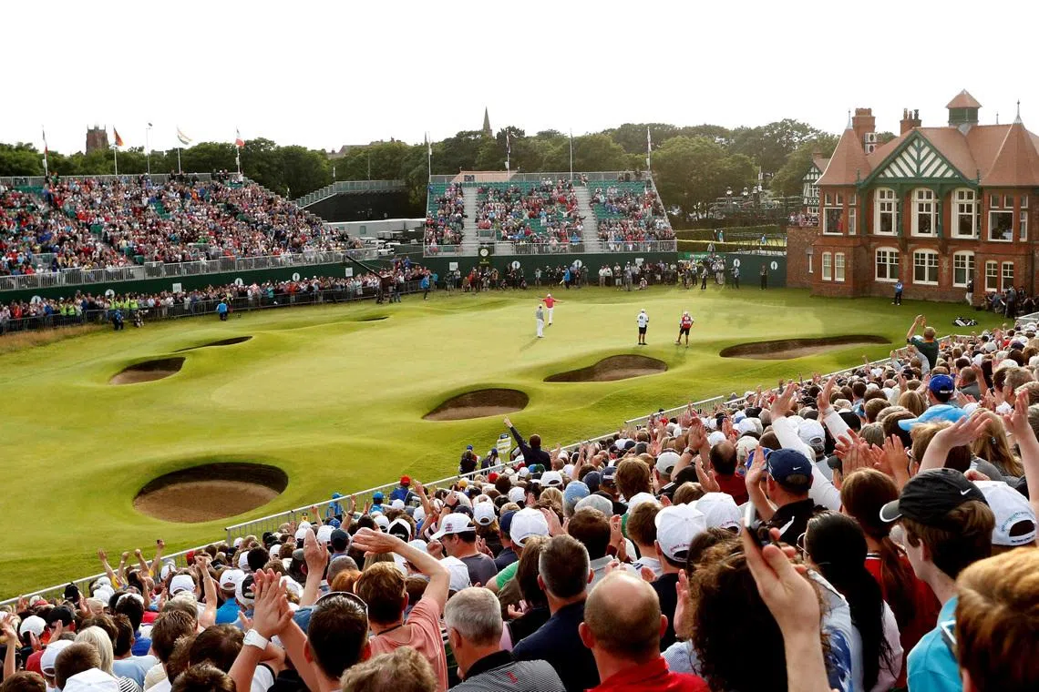 FILE PHOTO: Golf - The 141st Open Championship - Royal Lytham & St Annes - 21/7/12   General view as USA's Brandt Snedeker celebrates a birdie on the 18th hole while Australia's Adam Scott looks on during the third round   Mandatory Credit: Action Images / Andrew Boyers   Livepic/File Photo