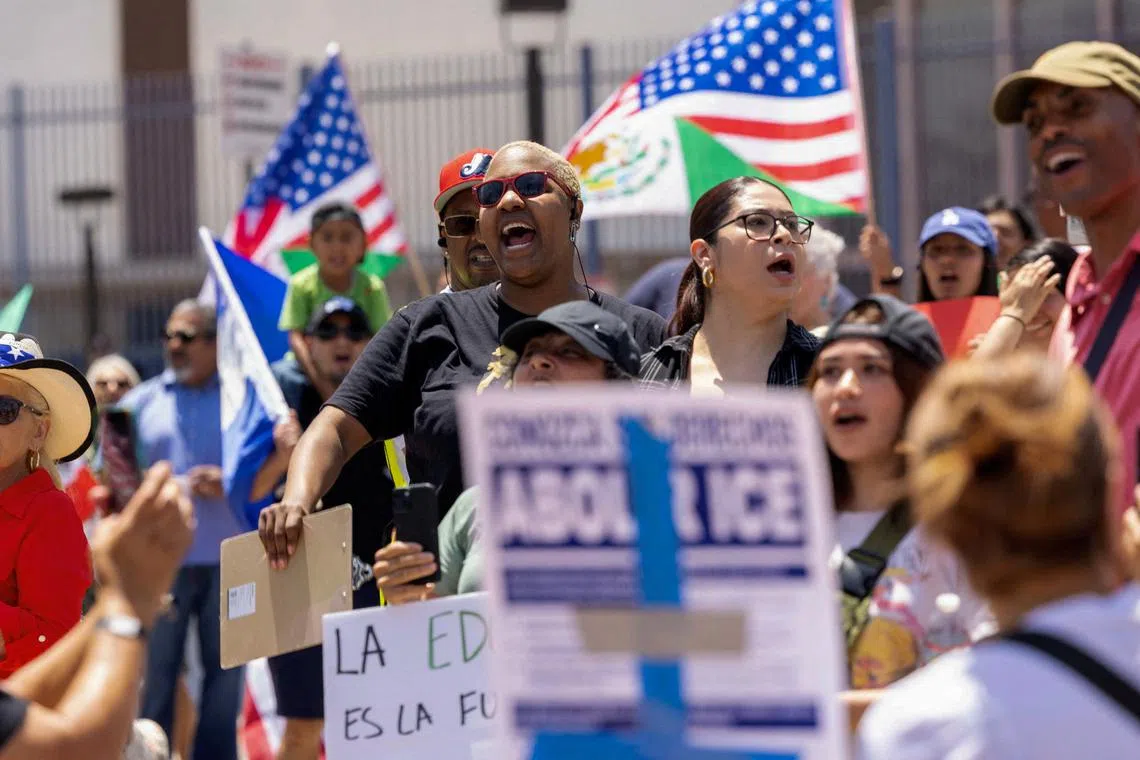 FILE PHOTO: The crowd chants outside the Civic Center at the conclusion of a 'cabalgata' for human rights, following multiple detentions by Immigration and Customs Enforcement (ICE), in the Los Angeles County city of Compton, California, U.S., June 22, 2025.   REUTERS/Jill Connelly/File Photo