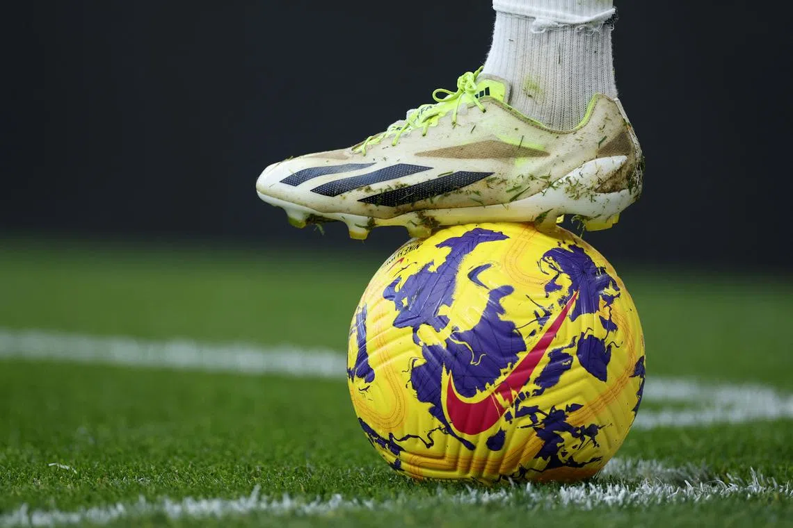 FILE PHOTO: Soccer Football - Premier League - Arsenal v Brighton & Hove Albion - Emirates Stadium, London, Britain - December 17, 2023 General view of Arsenal's Gabriel Martinelli's boot and the ball Action Images via Reuters/John Sibley/File Photo