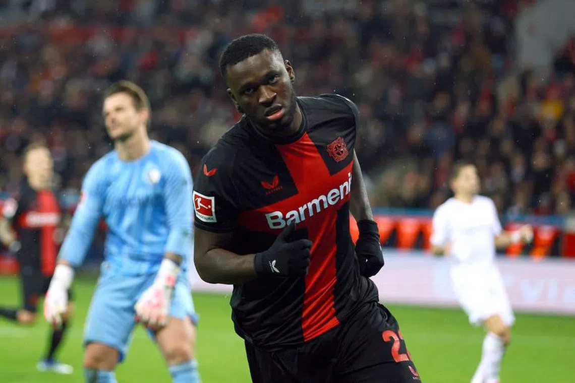 FILE PHOTO: Soccer Football - Bundesliga - Bayer Leverkusen v VfL Bochum - BayArena, Leverkusen, Germany - December 20, 2023 Bayer Leverkusen's Victor Boniface celebrates scoring their fourth goal REUTERS/Thilo Schmuelgen/File Photo