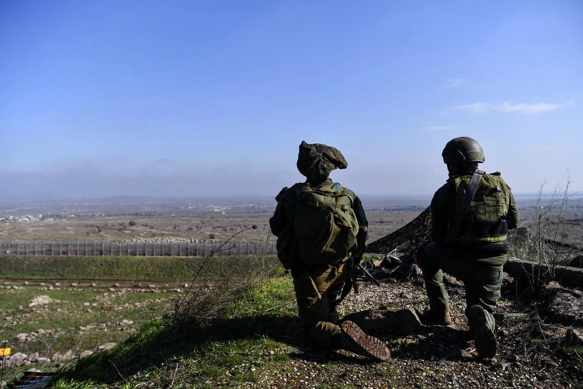 Israeli soldiers operate in the Israeli-occupied Golan Heights near the border with Syria, amid the ongoing conflict between Israel and the Palestinian Islamist group Hamas, December 28, 2023. REUTERS/Gil Eliyahu/ File Photo