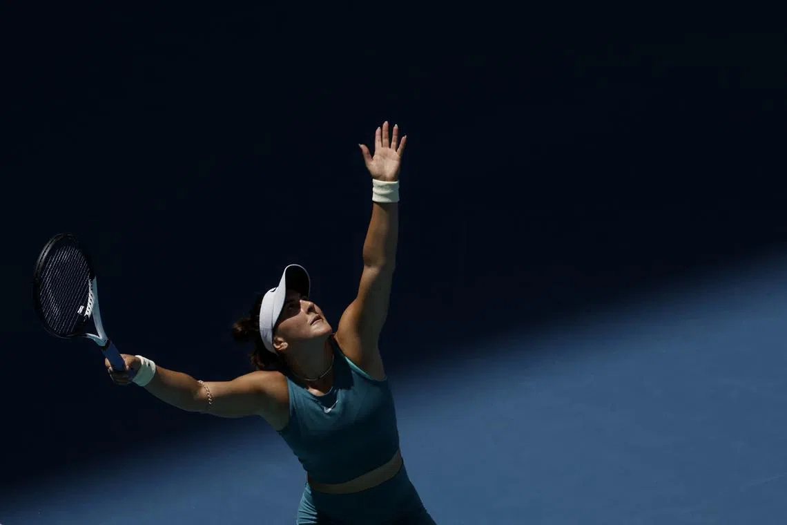 Bianca Andreescu serves against Sophia Kenin at Hard Rock Stadium.
