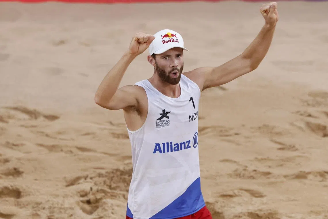 2022 European Championships - Beach Volleyball - Konigsplatz, Munich, Germany - August 17, 2022 Norway's Anders Berntsen Mol celebrates after winning his Men's Preliminary match with Christian Sandie Sorum against Sweden's David Ahman and Jonatan Hellvig REUTERS/Michaela Rehle