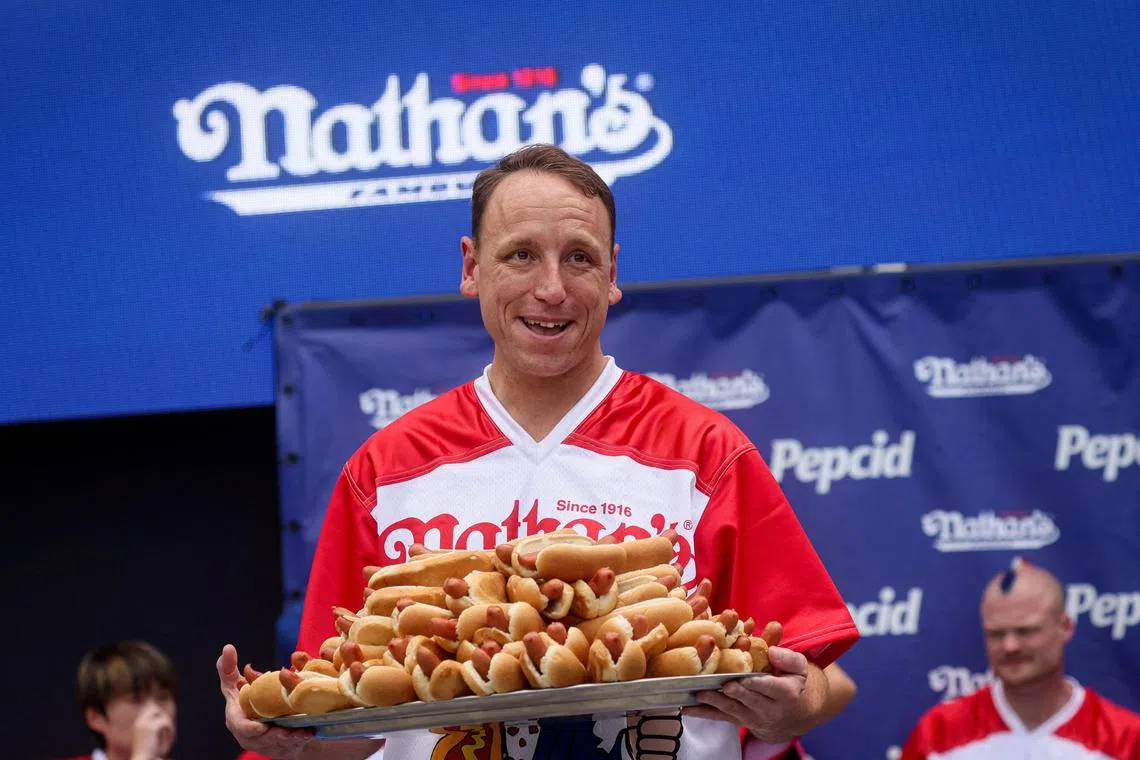 World Champion Joey Chestnut during the weigh-in ceremony ahead of  2023 Nathan's Famous Fourth of July International Hot Dog Eating Contest in Coney Island Brooklyn in New York City.