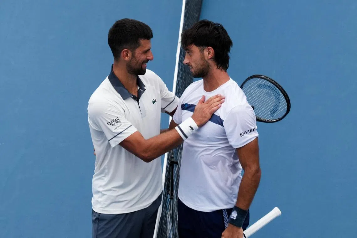 Serbia’s Novak Djokovic (left) congratulating Argentina’s Thiago Agustin Tirante after their Cincinnati Open match on Aug 15.