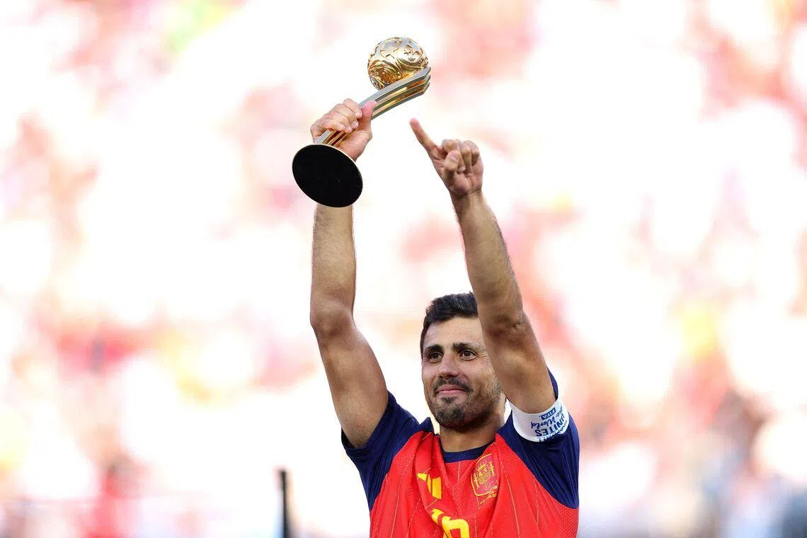 Spain’s Rodri celebrating on the podium after winning the Golden Ball following the FIFA World Cup 2026 final.