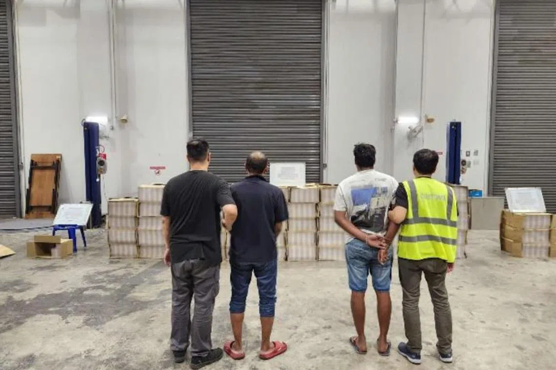 A 44-year-old Singaporean man and 21-year old Malaysian man were arrested.