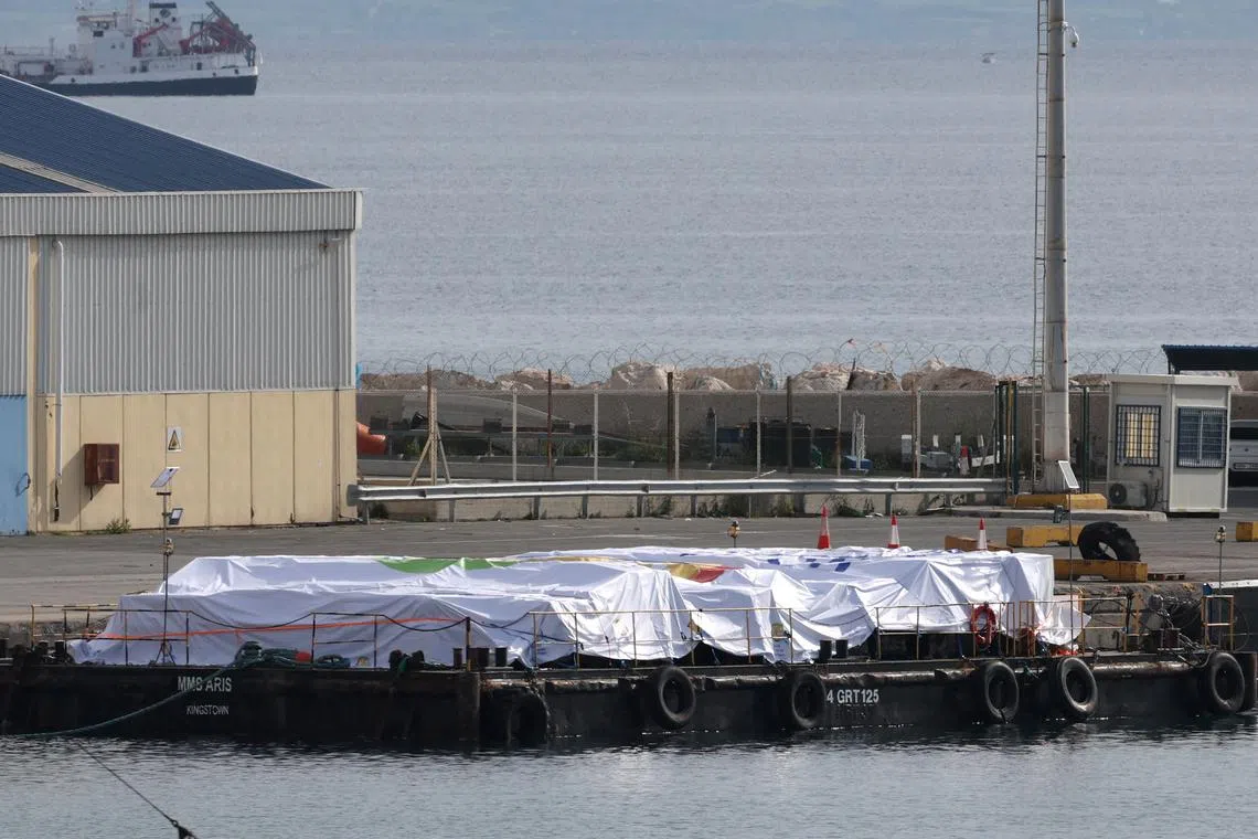 Humanitarian aid for Gaza is loaded on a platform at the port of Larnaca, Cyprus March 10, 2024. REUTERS/Yiannis Kourtoglou