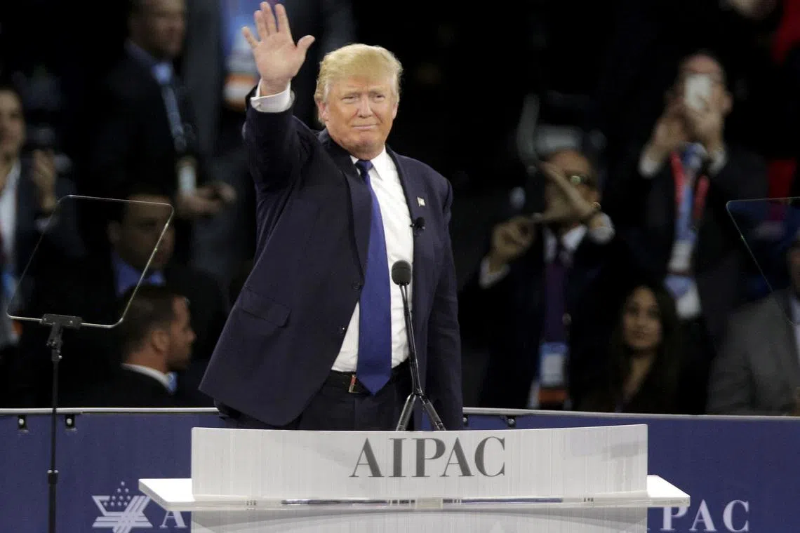 FILE PHOTO: Republican U.S. presidential candidate Donald Trump waves after addressing the American Israel Public Affairs Committee (AIPAC) afternoon general session in Washington March 21, 2016.REUTERS/Joshua Roberts/File Photo